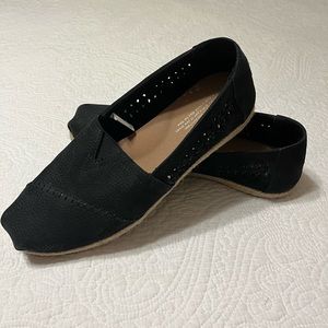 Tom’s Black slip ons